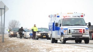Emergency personnel respond to a fatal crash on Interstate 35 Jan. 30 four miles north of the Iowa border. -- Brandi Hagen/Albert Lea Tribune