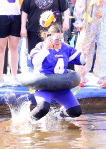 A Minnesota Vikings fan jumps into Fountain Lake Saturday for the polar plunge. --Brandi Hagen/Albert Lea Tribune