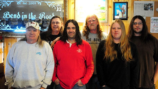 Six men will say farewell to their long hair Saturday at the Bend in the Road in Manchester as they cut it for Locks of Love. Bar owner, Scott “Mule” Juveland, hopes the haircuts will raise money from patrons to donate to cancer research. From left: Doug “Felt” Felt, Troy “Wezy” DeBoer, Doug “Snuggs” Fink, Juveland, Erik “Ellen” Prudoehl and Matt “Daryl” Bronson. -- Brandi Hagen/Albert Lea Tribune