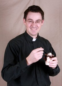 The Rev. Mark Niethammer of Salem Lutheran Church holds a hot fudge sundae. The pastor began a get-together called Desserts and Dreams. Stories like this one appear in Progress 2013, which comes out Sunday. --Brandi Hagen/Albert Lea Tribune
