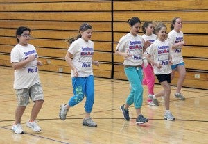 Students at Southwest Middle School run while completing a fitness test on Tuesday. -- Kelli Lageson/Albert Lea Tribune