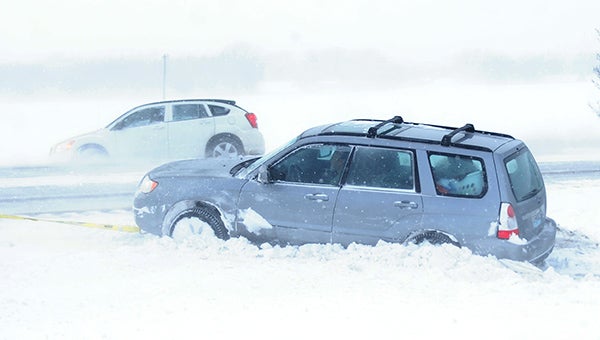 Several cars were in the ditches and median of Interstate 35 near Clarks Grove Monday afternoon. --Brandi Hagen/Albert Lea Tribune