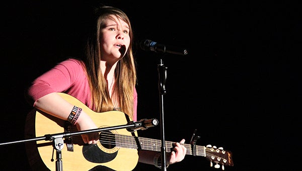 Savannah Simpson practices her song Tuesday after school. She performs at Tigers Roar tonight, Friday and Saturday at Albert Lea High School. --Kelli Lageson/Albert Lea Tribune
