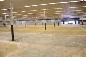 An orchard of poles occupies the interior of the former Walmart building in Albert Lea. The new drywall was hung on the walls this winter.