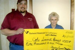 Freeborn County Thrivent chapter board member, Joyce Fredin, presents a $1,000 check in supplemental funding from Thrivent Financial for Lutherans to Casey Soost for the Cole Jacob Soost fundraiser held Feb. 10 at the Alden Community Center. --Submitted