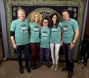 Kellen Kaasa presented the band Little Big Town with Minnesota Special Olympics “End the R-Word” T-shirts at their concert in Rochester on March 22. From left are Phillip Sweet, Kimberly Schlapman, Kaasa, Karen Fairchild and Jimi Westbrook. --Submitted