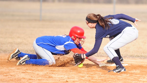 Madi Ziebell tries to tag out a Mabel-Canton player Monday at second base. — Brandi Hagen/Albert Lea Tribune