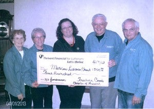 The Freeborn County Chapter of Thrivent board members Jo Ann Haroldson, Nancy Ver Hey, Neil Pierce and Mervil Boettcher presented a $500 supplemental funding check from Thrivent Financial of Lutherans to Kris Wilkie of the Moscow Lutheran Church for their church siding project fundraiser held March 3. --Submitted