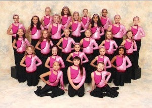 The fourth-grade Just for Kix dancers earned second place in competition at Rochester Technical Community College. Front row from the left are Lexie Abrego, Abigail DeLafosse and Stephanie Redman. Second row from the left are Gracie Tufte, Laynie Bure, Cora Noer, Carissa Nelson and Avery Hill. Third row from the left are Jaden Schumaker, Kayla Senne, Shayanne Sailor, Mikayla Hillman, Hannah Conn and Ashly Yost. Fourth row from the left are Kayla Schmidt, Ellie Wallace, Anna Dahl, Julia Morrow, Brittany Barreda-Yebra, Sarena Ewers and Lydia Levi. Back row from the left are Madison Doyle, Shelby Hanson, Lauren Thunstedt and Cynthia Hererra. Not pictured are Makayla Anderson, Ann Huper, Kyra Madrigal, Emma Piechowski and Jaiden Venem. — Submitted