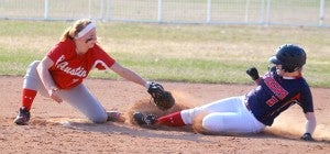 Albert Lea’s Taylor Thompson tries to avoid the tag of Austin’s Shayley Vesel as she slides into second base during a doubleheader at Todd Park in Austin Monday. Thompson was three for four in game one with three stolen bases. Albert Lea swept Austin 8-6 in game one and 9-6 in game two. The Tigers have already eclipsed the number of conference wins from last year with four. — Rocky Hulne/Albert Lea Tribune
