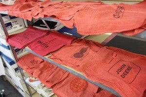 A direct-to-garment printing machine enables Jensales to print cherished agriculture implement logos on shop rags. Paul Jensen said this has been a popular gift item for fathers and grandfathers.