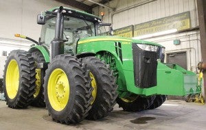 This tractor is a brand new John Deere 8335R. It has 335 horsepower. This tractor is outfitted with a rock box on the front, which are locally made in Emmons. --Kelli Lageson/Albert Lea Tribune