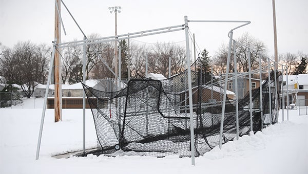 Beams from the two-year-old batting cage at Hayek Field remain ajar after the weight of the snow made them collapse. — Micah Bader/Albert Lea Tribune