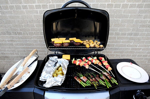 A little grill can cook a lot of food if the grill has two levels. The grillmaster needs to have experience with how long foods take. Always keep the heat on low and medium levels. It also helps to have a sense of a grill’s hot spots. Potatoes take the longest, then meat, then veggies. -- Brandi Hagen/Albert Lea Tribune