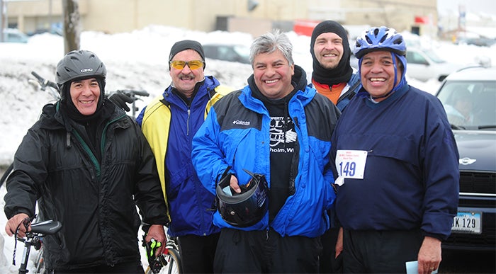 Team Navarro stands together in Albert Lea outside the Sibley Elementary warming house Saturday after riding in the Freeborn County Bike-A-Thon. From the left are Dave Navarro, Scott Norman, Rich Navarro, Brian McDonald and Ramon Navarro. Robert said the team participated to support cancer research.  — Micah Bader/Albert Lea Tribune