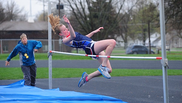 Taylor Willis, a sophomore from Albert Lea, performs the high jump Thursday at a dual with Austin. — Micah Bader/Albert Lea Tribune   