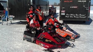 Members of the Pole Shed Racing team took a photo together at a race in Grey Eagle. In back are Mark Rauenhorst and Darren Sonnek. In front are Larry Fisher and Dr. John Enger. — Submitted
