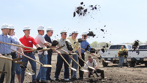 Dirt is thrown during a groundbreaking ceremony for United South Central in Wells on Wednesday. -- Kelli Lageson/Albert Lea Tribune