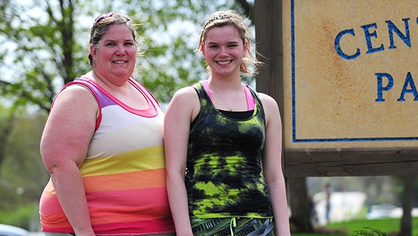 Tammy Krowiorz and her daughter Ashley plan to participate in The Color Dash in Owatonna at 10 a.m. Saturday. The event is set up to raise funds to produce a movie called “To Say Goodbye.” It is a film that attempts to reach those who are bullied or contemplating suicide. Tammy and Ashley are standing in Albert Lea’s Central Park where Tammy has been going on walks to prepare for the 5k race. --Micah Bader/Albert Lea Tribune