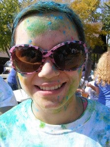 Ashley Krowiorz of Albert Lea is covered with color at the conclusion of the 2012 Color Dash in Owatonna. Krowiorz will participate in the run for the second straight year. --Submitted