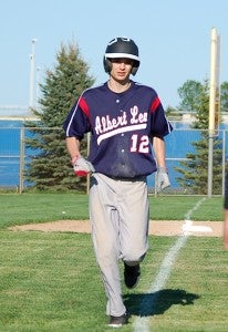 Wyatt Paulsen crosses the plate after a two-run home run against the Raiders on Thursday. --Shelly Burkard/For the Albert Lea Tribune