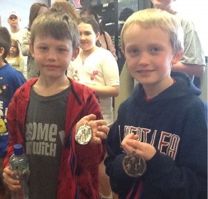 Carson Knutson and Chase Zak tied for third-place bronze medals at a chess tournament April 27. -- Submitted