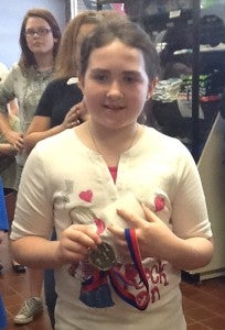 Rachael Holcomb was the trophy and gold medal winner in the chess tournament April 27 in Albert Lea.