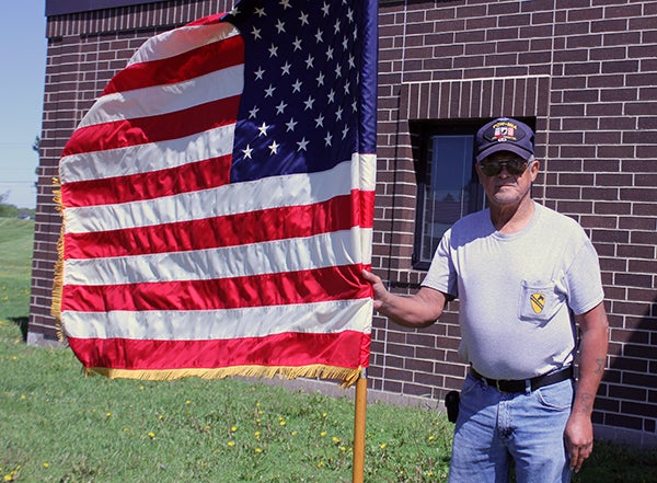 Jose Avelar has great respect for the American flag; he will often ask businesses or residents to replace tattered flags. -- Kelli Lageson/Albert Lea Tribune 