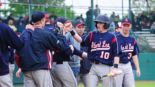 Johnathan Fleek, a junior from Albert Lea, scored the first run of the game in a 3-2 loss Monday to Rochester John Marshall at Bell Field in Faribault. The game was the first round of the consolation bracket of the Section 1AAA tournament. — Micah Bader/Albert Lea Tribune