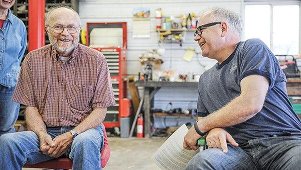 Arvid Jovaag and Rep. Tim Walz share a laugh Thursday during Walz’s visit to the Jovaag family farm south of Austin. --Eric Johnson/Albert Lea Tribune