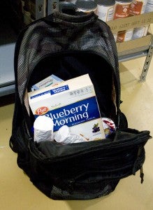 The backpacks each weekend contain enough food for two breakfast meals and two lunch meals for each child, plus snacks. Foods commonly placed in the bags are cereal, oatmeal, microwaveable soup packages, pudding and gelatin.
