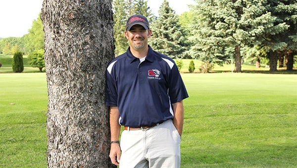 Casey McIntyre, the Albert Lea boys’ golf head coach, stands at Green Lea Golf Course Monday before his team’s awards banquet. McIntyre led the Tigers through a season with nine postponed meets due to weather. --Micah Bader/Albert Lea Tribune