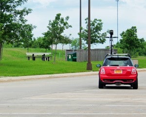 A Mini Cooper from New York drives away from the welcome center. Travelers from all 50 states stop at the welcome center.