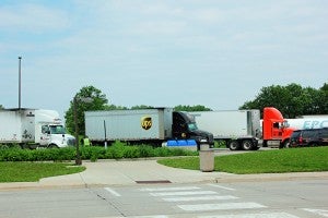 Semis are lined up at the Minnesota Welcome Center. The welcome center is sometimes used as a spot for a routine checkpoint for truckers.