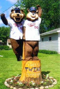 The Minnesota Twins mascot T.C. Bear visited United South Central on May 31 for the third- and fourth-grade track and field day. While he was in town, T.C. Bear visited the home of Tom and Sandy Schroeder, who live a block away from the school, to see their tree carving of him done by Tracy and Bess Coy of Waldorf. -- Submitted
