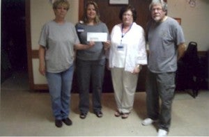 The Eagles Club donated $500 to Crossroads hospice. Shari Sipple and Dave Skogheim presented the check to Renae Meany and Marietta Stien.