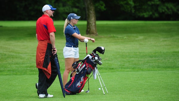 Albert Lea head coach Shawn Riebe, left, and Megan Pulley look down the fairway of the fifth hole on the front nine at Bunker Hills Golf Course Wednesday on Day 2 of the Class AAA state golf tournament. — Micah Bader/Albert Lea Tribune