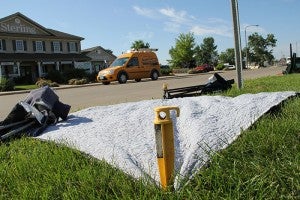 One person staked a claim with actual stakes Tuesday along Bridge Avenue at New Denmark Park. -- Tim Engstrom/Albert Lea Tribune