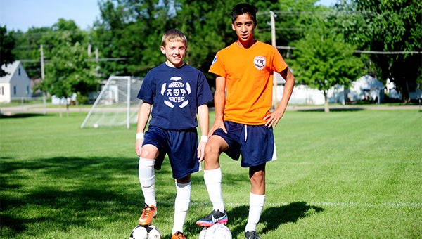 Drew Sorenson, left, and Anthony Huerta-Apanco stand Tuesday at Memorial Park in Albert Lea before playing the final game of the regular season as part of Albert Lea’s U13 boys’ soccer team. Albert Lea won 7-0. Sorenson and Huerta-Apanco have been selected to represent Minnesota Sunday at a regional camp. — Micah Bader/Albert Lea Tribune
