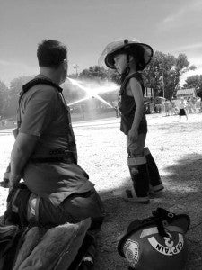 Amber Schewe took this photo of her husband Derek and their son, Easton, at a fireman’s tournament in Alden. Schewe wrote, “Easton really looks up to his daddy and wants to be a firefighter more than anything in the world.”