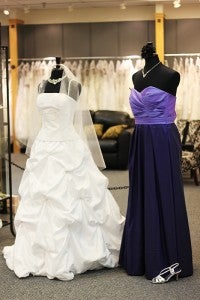 A bridal gown and bridesmaid dress are a couple of the many items on display at Bliss.