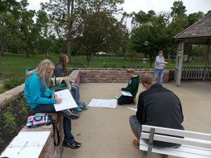 Glenville officers plan goals for the upcoming year at a park in Sioux Falls. From left are McKenna Cech, Mady Wangen, Sam Johnson, Spencer Wangen (top) and Dalton Nesset. -- Submitted
