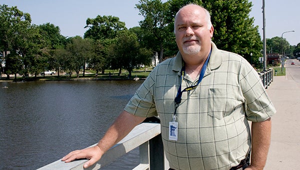 Freeborn County Emergency Management Director Rich Hall stands over Fountain Lake, where there was high water in June because of heavy rains. Hall is submitting damage estimates from the storm in an effort to obtain federal assistance. --Sarah Stultz/Albert Lea Tribune