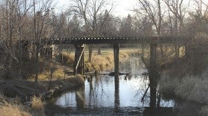 One of the more scenic parts of the former rail corridor is a bridge over a creek at Shoff Park. Trail users will be able to see the park on their left and Dane Bay on their right. --Tim Engstrom/Albert Lea Tribune