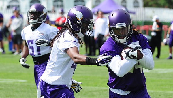 Cordarrelle Patterson of the Minnesota Vikings runs past a defender Friday during the first day of training camp on the Minnesota State University campus in Mankato. — Micah Bader/Albert Lea Tribune