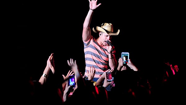 Fans packed around the stage during the Dustin Lynch concert in the Grandstand on Thursday to take photos and touch his hand. --Brandi Hagen/Albert Lea Tribune