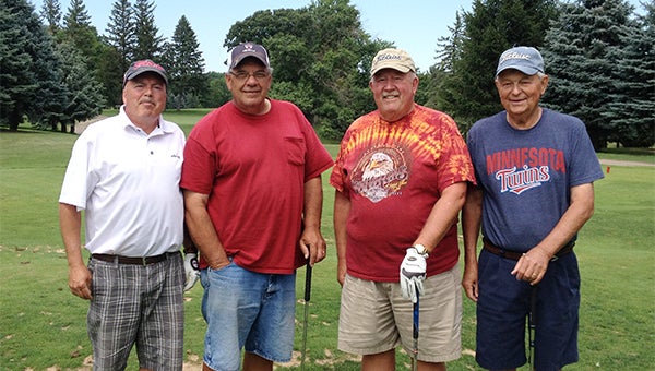 Larry Runden of Albert Lea recorded a hole-in-one on hole No. 8, a par three, at Green Lea Golf Course on July 23, according to course golf professional Jeff Elseth. From the left are Scott Rasmussen, Runden, Vance Mickelson and Jack Briggs. — Submitted   