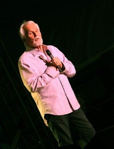 Kenny Rogers speaks to the crowd about being in the music industry for 50 years. -- Erin Murtaugh/Albert Lea Tribune