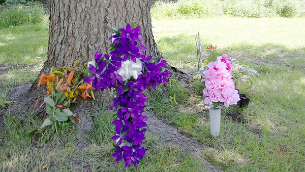 Area residents have dropped off flowers at Northwood's Swensrud Park where Justina Smith was stabbed Monday morning. Smith ultimately died from her injuries. -- Sarah Stultz/Albert Lea Tribune     