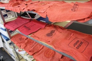 A direct-to-garment printing machine enables Jensales to print cherished agriculture implement logos on shop rags.  --Tim Engstrom/Albert Lea Tribune